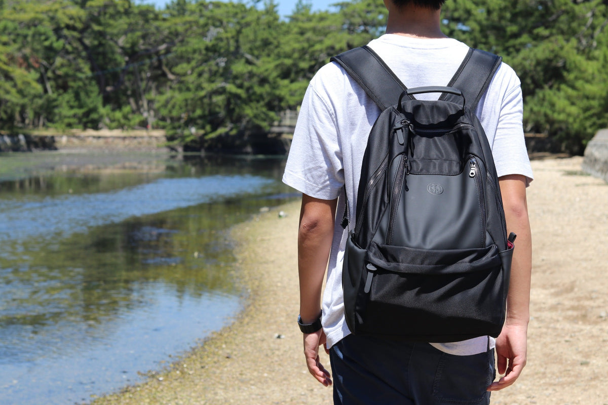 KARAKURI backpack worn outdoors